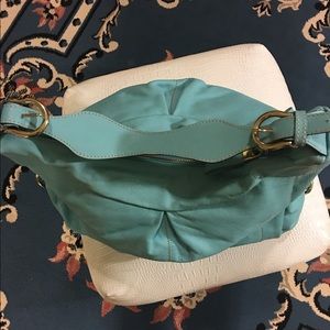 Genuine Leather Avida Turquoise shoulder bag.
